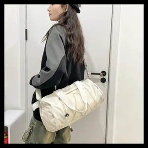 Detail view of lightweight casual sports duffel bag, spacious interior for gym and travel.