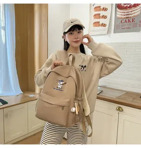 Casual canvas backpack for women large capacity school bag with cute dog embroidery.