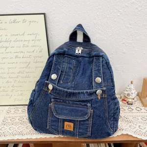 Vintage denim backpack for women, stylish college student casual travel rucksack with metal details.