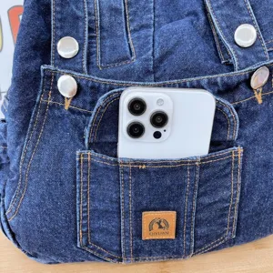 Dark blue denim school backpack with multiple pockets and metal buttons for women daily commute