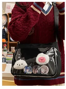 Clear window ita bag for pins and plushies, black crossbody bag for daily anime fashion.