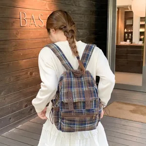 Retro plaid canvas backpack for women, casual school bookbag with multi pockets and straps.