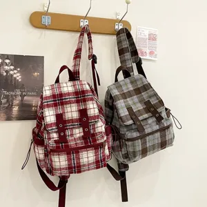 Japanese vintage plaid backpack for women, retro casual double shoulder school bag daily style.