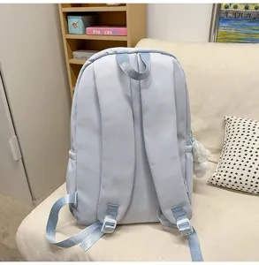 Sac à dos bleu clair décontracté pour femmes, sac d'école minimaliste quotidien avec bretelles.