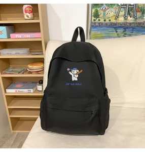 Black school backpack for students, large casual travel daypack with cute puppy embroidery.