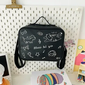 Black casual shoulder backpack with cute doodle cat and dog prints for women student daily