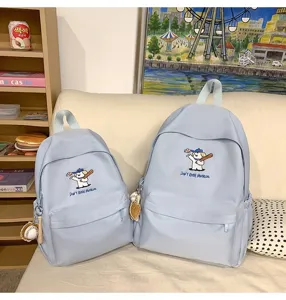 Light blue cute embroidered puppy school backpack set for students, stylish and large capacity daily bag.