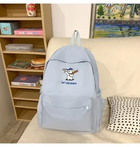 Casual light blue backpack with cute embroidered dog, large capacity for daily school and travel.