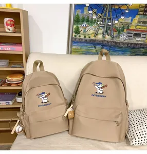 Khaki canvas large capacity backpack with cute puppy embroidery, casual school bag for use.
