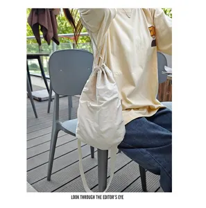 Detailed view of the casual nylon drawstring crossbody bag, perfect for daily streetwear.