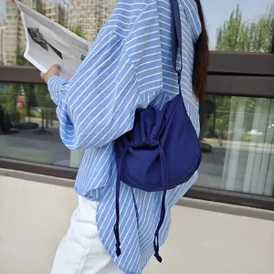 Nylon crossbody bag for women and men, large capacity drawstring dumpling bag street style
