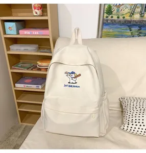 Cute embroidered puppy backpack for women, large capacity casual school bag for daily travel.