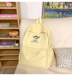 Yellow canvas school backpack for teen girls, large capacity casual daily travel book bag.