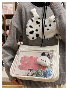 Clear ita bag for enamel pins and badges, white crossbody shoulder bag with transparent window.