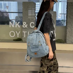 Vintage light blue denim backpack with multi pockets, stylish and casual daypack for daily.