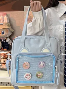 Light blue canvas itabag with clear mesh pocket and cute bear ears, crossbody student bag.