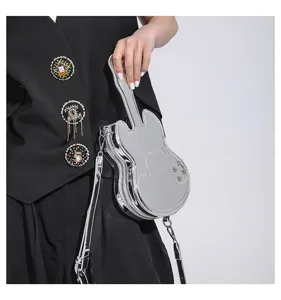 Chic metallic silver guitar shaped shoulder bag for women, trendy crossbody bag with unique design.