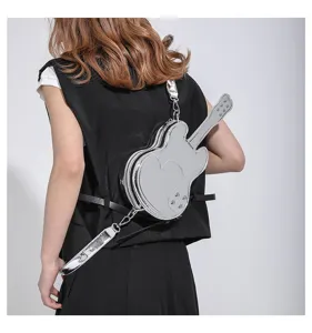 Silver metallic guitar shaped shoulder bag, showcasing unique punk style and back detail.