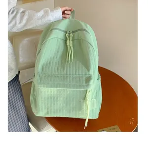 Sac à dos étudiant vert clair grande capacité, cartable décontracté pour les voyages et trajets.
