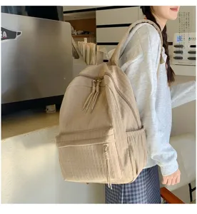 Sac à dos en toile décontracté pour femme, grand cartable pour voyage et travail quotidien.