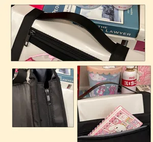 Canvas ita bag detail shot showing smooth zipper, sturdy handle and spacious front pocket compartment.
