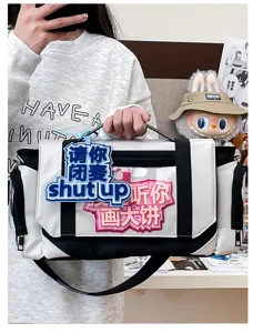 Large capacity anime pain bag with transparent window, black and white canvas shoulder messenger bag.