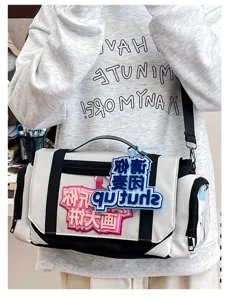 Detailed view of large capacity anime ita bag shoulder cross body bag for students.