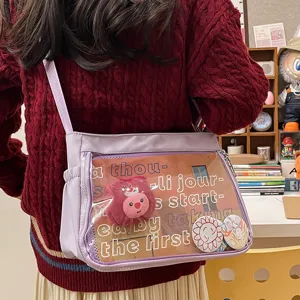 Casual versatile ita bag transparent front pocket shoulder bag for daily commuting and anime fans.