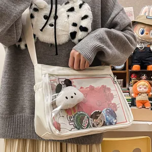 Casual canvas ita bag with clear window for anime badges, pins, and plush toys. Stylish crossbody.
