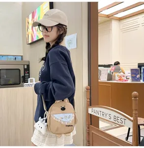 Joli sac bandoulière en toile de chiot de dessin animé pour femmes, style japonais décontracté.