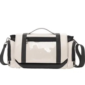 Detailed view of the cute pain bag clear window and durable black shoulder straps.