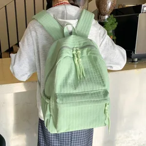 Sac à dos étudiant vert clair décontracté, grand sac de voyage minimaliste pour le travail.