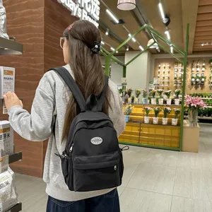 Koreanischer Stil schwarzer Mini Rucksack fuer Damen, laessige Schultasche fuer Alltag.