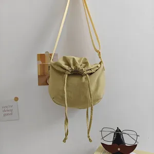 Casual nylon drawstring crossbody bag for women and men, large capacity dumpling shoulder bag.