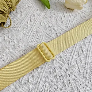 Nylon crossbody bag adjustable strap detail, durable webbing material for daily use.