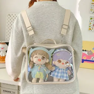 Clear window backpack detail featuring two cute plush dolls inside, perfect for anime fan daily use.