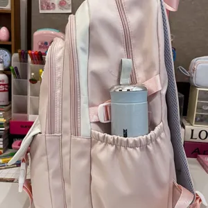 Rosa großer Kapazität Studenten Schulrucksack Detailansicht mit Seitentasche und Reißverschluss.