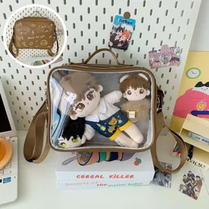 Clear PVC front window ita bag detail showing plush doll storage capacity and cute embroidery design.