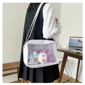 Clear ita bag with cute purple hair doll detail, transparent window shoulder bag design.