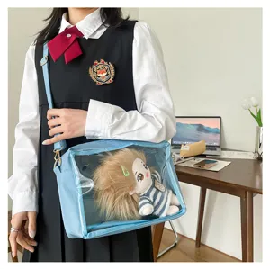 Details of light blue transparent ita bag, clear window for 25cm plush dolls, crossbody.