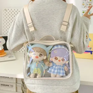 Cute 20cm doll ita bag with transparent front window and two lovely plush dolls inside.