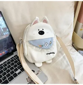 Sac bandoulière mignon en toile blanche chiot avec bavette en dentelle pour filles mignonnes.