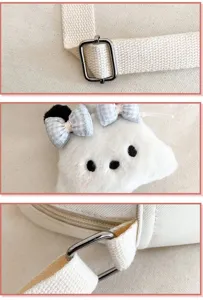 Gros plan sur les détails du sac bandoulière chiot avec tête en peluche et boucles en métal.