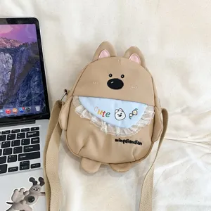 Joli petit sac bandoulière en toile pour femme motif chiot dessin animé style japonais décontracté.
