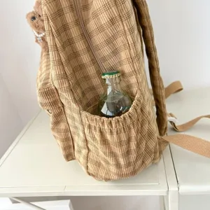 Λεπτομέρεια καρό σακιδίου πλάτης από κορντουρόι, που δείχνει καθαρά την πλαϊνή τσέπη.