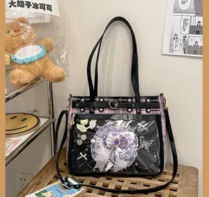 Detailed view of the Japanese anime style ita bag showing transparent window and plaid pattern.
