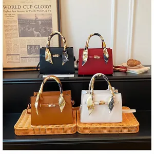 Classic PU leather top handle handbag with stylish silk scarf decor, elegant commuter shoulder bag.