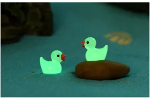 Luminous resin duck miniature figurine for micro landscape decoration, glowing dark cute toy.