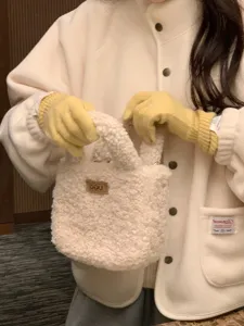 Gants de laine d'hiver chauds pour femmes, gants tactiles tricotés élégants pour l'extérieur.