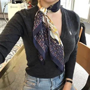 Stylish women silk scarf with classic polka dot pattern, elegant neckerchief for daily wear.